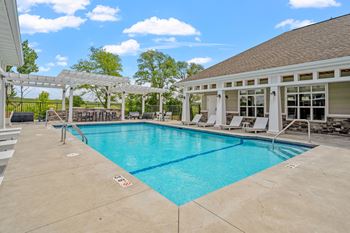 Sparkling Outdoor Pool with Expansive Sundeck